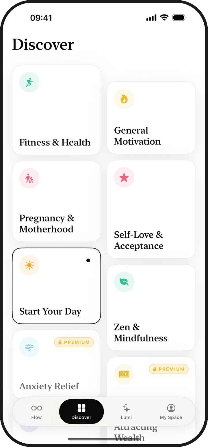 The Discover screen in Lumina showing thirteen affirmation categories